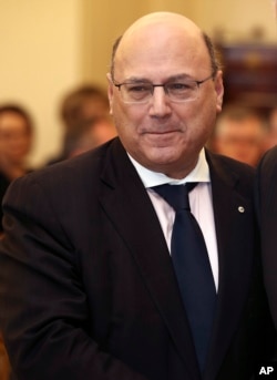 In this July 19, 2016 photo, Arthur Sinodinos is sworn in as Senator for New South Wales by the Governor General Sir Peter Cosgrove at Government House in Canberra, Australia.