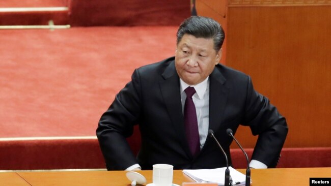 中国国家主席习近平在北京人大会堂参加纪念中国改革开放40年的纪念会。（2018年12月18日）