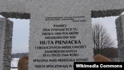 An undated photo shows part of a monument honoring hundreds of Poles killed in Huta Pieniacka, present-day Ukraine, in 1944. (Credit - Stako)