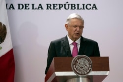 Mexican President Andres Manuel Lopez Obrador speaks during a ceremony marking the third anniversary of his presidential election at the National Palace in Mexico City, July 1, 2021.