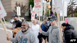 Striking Boeing workers and their supporters picket outside the company's manufacturing facility in Renton, Washington, on Sept. 16, 2024. Boeing announced on Sept. 18 temporary furloughs of professional and white-collar staff for the duration of the strike.