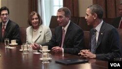 Prezidan ameriken an Barack Obamak ap tande John Boehner