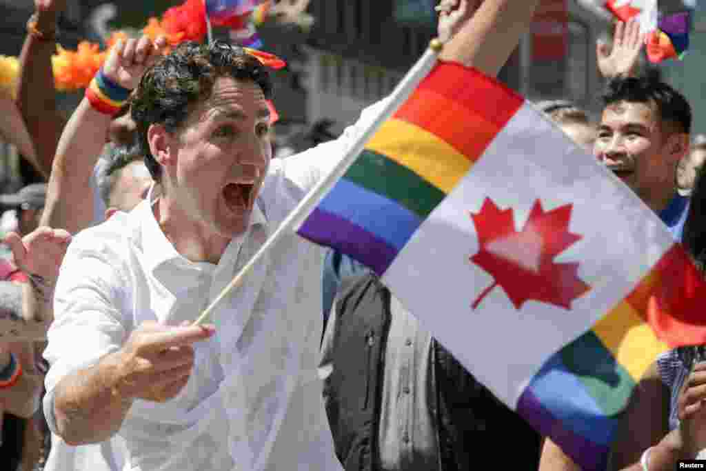 Canada&#39;s Prime Minister Justin Trudeau joins supporters of Toronto&#39;s LGBTQ community as they march in one of North America&#39;s largest Pride parades, in Toronto, Ontario, June 23, 3019.