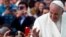 FILE - Pope Francis waves to the crowd as he arrives for a holy mass at Simon Bolivar park in Bogota, Colombia, Sept. 7, 2017. 