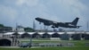 FILE - A U.S. Air Force KC-135 Stratotanker refueling tanker aircraft takes off from the Kadena Air Base in Kadena Town, Okinawa, Japan, on Aug. 30, 2023. U.S. Marines stationed in Okinawa began a partial transfer to Guam on Dec. 14, 2024.