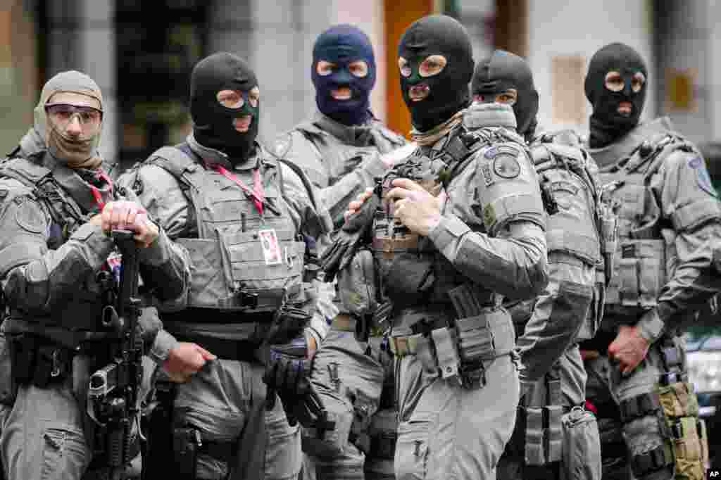 Officers of the Belgian Special Police patrol around the perimeter of the hotel of U.S. President Barack Obama in Brussels. President Obama has arrived in Brussels for a meeting with fellow G7 heads of state focused on the crisis in Ukraine.