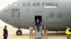 FILE - Then-Vice President Joe Biden steps off a C-17 military transport plane upon his arrival in Baghdad, Iraq, April 28, 2016.