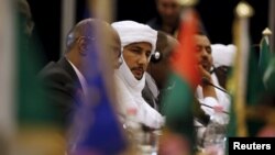 FILE - Bilal Agh Cherif (C), secretary general of The Coordination of the Movements of Azawad (CMA), attends the peace talk meeting in Algiers, Algeria, Jan. 18, 2016. Mali's government and Tuareg-led rebels held talks in Algiers on Monday aimed at advancing a peace agreement brokered last year to end decades of separatist fighting.