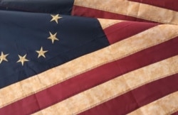 The Betsy Ross flag is an early design of the U.S. flag, named for Pennsylvania flag maker Betsy Ross. The pattern is 13 alternating red-and-white stripes with stars in a field of blue in the upper left corner canton. (Photo: Diaa Bekheet)
