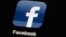 FILE - The Facebook logo is displayed on an iPad in a May 16, 2012 illustration photo. 