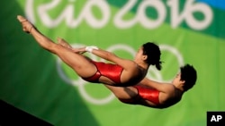 China's Liu Huixia and Chen Ruolin compete during the women's synchronized 10-meter platform diving final in the Maria Lenk Aquatic Center at the 2016 Summer Olympics in Rio de Janeiro, Brazil, Aug. 9, 2016.