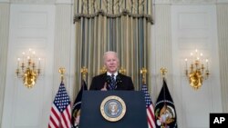 President Joe Biden delivers remarks on the October jobs report from the State Dining Room of the White House, Nov. 5, 2021, in Washington.