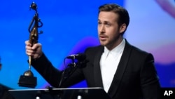 Ryan Gosling accepts the Vanguard Award for "La La Land" at the 28th annual Palm Springs International Film Festival Awards Gala, Jan. 2, 2017, in Palm Springs, California.