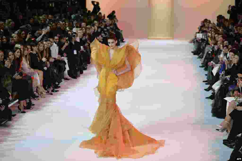 A model presents a creation by Stephane Rolland during the Haute Couture Spring-Summer 2014 collection show in Paris, France.