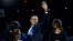 President Barack Obama, accompanied by first lady Michelle Obama and daughters Malia and Sasha, arrives at the election night party in Chicago, early Wednesday, Nov. 7, 2012.