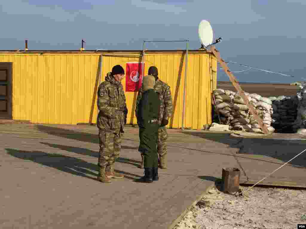 Members of the Noman Chelibijihan Battalion are mostly Tatars but group leaders tell VOA there are also Ukrainians, Chechens, and Afghans. (L. Ramirez/VOA)