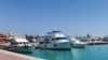 Kapal pesiar dan perahu berlabuh di marina di resor Laut Merah Mesir di Hurghada setelah sebuah kapal wisata tenggelam di lepas pantai Laut Merah, Mesir, 25 November 2024. (Stringer/REUTERS)