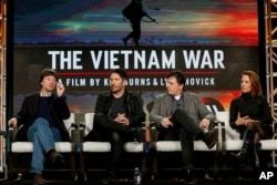FILE - Ken Burns, from left, Trent Reznor, Atticus Ross and Lynn Novick speak at PBS' "The Vietnam War" panel at the 2017 Television Critics Association press tour in Pasadena, Calif.