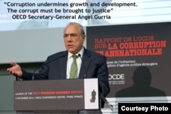 FILE - OECD Secretary-General Angel Gurria.