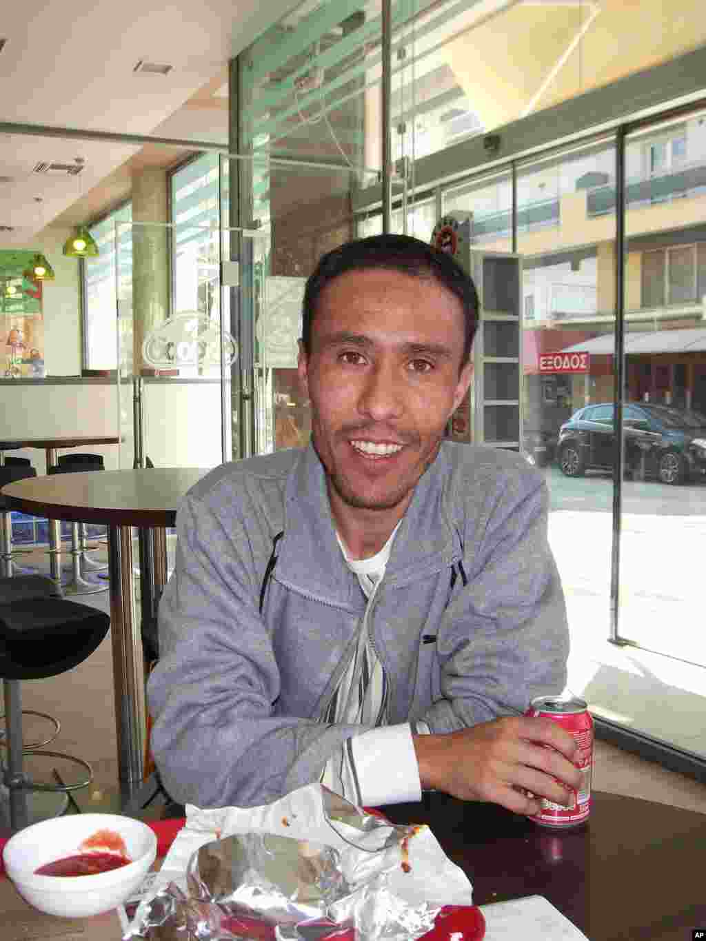 Afghan migrant Wajid crossed into Greece from Turkey 4 years ago and is still waiting for his asylum application to be processed (VOA Photo H. Ridgwell)