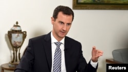 바샤르 알 아사드 시리아 대통령이 지난 20일 다마스쿠스에서 사나통신(SANA)과 인터뷰를 하고 있다. (자료사진) 