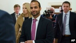 FILE - In this Oct. 25, 2018, file photo, George Papadopoulos, the former Trump campaign adviser who triggered the Russia investigation, arrives for his first appearance before congressional investigators, on Capitol Hill in Washington. 