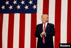 U.S. President Donald Trump arrives at a campaign rally in Phoenix, Arizona, Aug. 22, 2017.