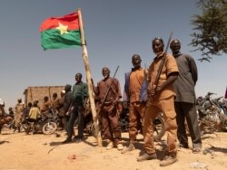 Members of civilian militias gather in Zagtouli to celebrate the organization’s sixth anniversary in Zagtouli, Burkina Faso, Feb. 14, 2021. (Henry Wilkins /VOA)