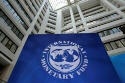 FILE - The International Monetary Fund logo is seen in Washington, April 21, 2017.