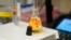 FILE - A water sample is measured as part of a PFAS drinking water treatment experiment, Feb. 14, 2023, at the U.S. Environmental Protection Agency in Cincinnati.
