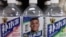 Bottled drinks by Eastroc Beverage with images of French soccer player Kylian Mbappe are displayed on a shelf at a store, in Beijing, China October 27, 2026.