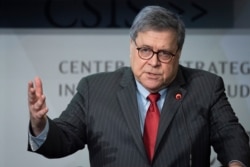 FILE - Attorney General William Barr speaks at the Center for Strategic and International Studies' China Initiative Conference, Feb. 6, 2020, in Washington.