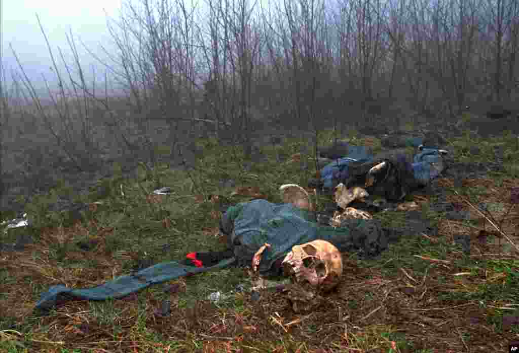 One of four clothed skeletons are on a hilltop just west of Srebrenica. (File 2006)