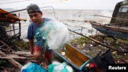 ໄຕ້ຝຸ່ນ Haiyan ພັດຖະຫຼົ່ມ ຟີລິບປິນ