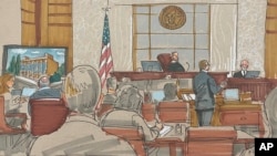 In this courtroom sketch, prosecuting attorney Eric G. Olshan questions witness Rabbi Jeffrey Myers of the Tree of Life Congregation, in the federal trial for 2018 synagogue massacre suspect Robert Bowers, on May 30, 2023, in Pittsburgh. 