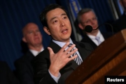 FILE - Joon H. Kim, the acting United States Attorney for the Southern District of New York, speaks at a news conference in New York City, April 25, 2017.