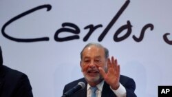 FILE - Mexican billionaire Carlos Slim gives a press conference in Mexico City, April 16, 2018.