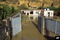 Esta fotografía muestra la casa inundada donde nueve personas murieron en Casteldaccia, cerca de Palermo, Italia, el domingo 4 de noviembre de 2018. (Mike Palazzotto: ANSA vía AP)