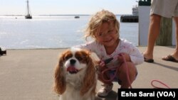 One of the girls’ dog and niece eagerly awaited her arrival on the dock.