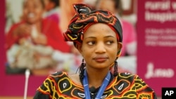 FILE - Yvette Azane Ngwemetoh, of Cameroon, a representative of rural women attends a meeting on occasion of the International Women's Day.