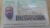 FILE - A photo shows the Pakistani passport and ID card that Mullah Akhtar Mansoor was allegedly carrying. Mansoor was killed in a U.S. drone strike Saturday near the Pakistan-Afghanistan border.