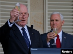 U.S. Vice President Mike Pence (right) and Australian Governor General Peter Cosgrove toast during a lunch reception for Australian and U.S. military servicemen and women at Admiralty House in Sydney, Australia, April 22, 2017.