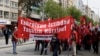 Protesters hold banners during a May Day protest in Ankara, Turkey, May 1, 2017. Workers and activists marked May Day with defiant rallies and marches for better pay and working conditions Monday. 