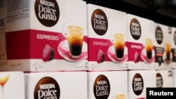 FILE - Instant coffee maker Nescafe boxes are pictured in the supermarket of Nestle headquarters in Vevey, Switzerland, February 16, 2017. (REUTERS/Pierre Albouy)