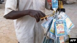 A vendor sells bags of rat poison in northern Nigeria's largest city of Kano, Jan. 18, 2016.