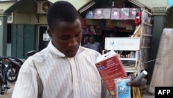 A vendor sells bags of rat poison in northern Nigeria's largest city of Kano, Jan. 18, 2016. Sales of rat poison have taken off in Nigeria following an outbreak of Lassa.