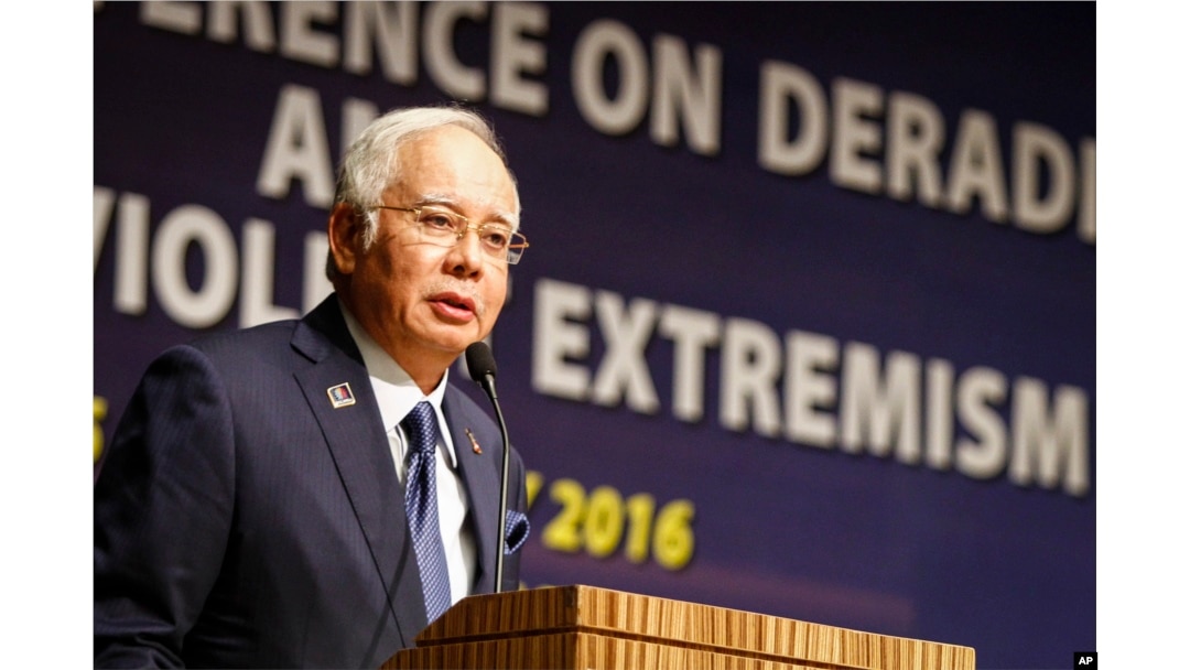 FILE - Malaysian Prime Minister Najib Razak speaks at a conference in Kuala Lumpur, Malaysia.
