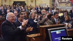 Members of the Congress attend the swearing in ceremony of a new Congress, which includes former members of the FARC who were given 10 seats as part of the 2016 peace process, in Bogota, Colombia, July 20, 2018.