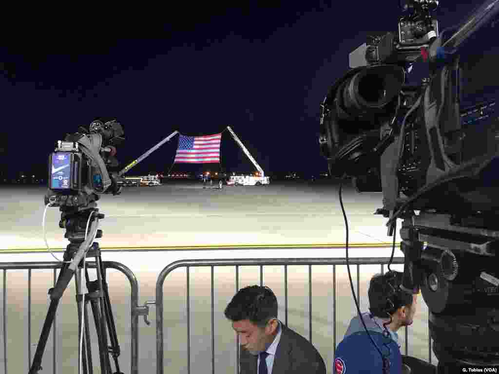 The press awaits arrival of President Donald Trump, Vice President Mike Pence, Secretary of State Mike Pompeo and the three Americans released from North Korea, early May 10, 2018, Andrews Air Force Base.