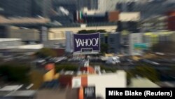 A news agency story says Yahoo provided the U.S. government with a tool that could scan incoming emails.